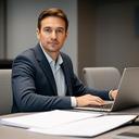 Professional portrait of a compliance manager seated beside a desk with documents and a laptop in a modern meeting room